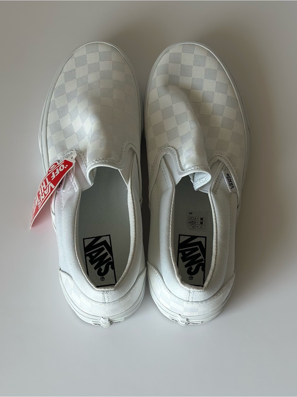 Vans Slip-On Sneakers in White Checkerboard